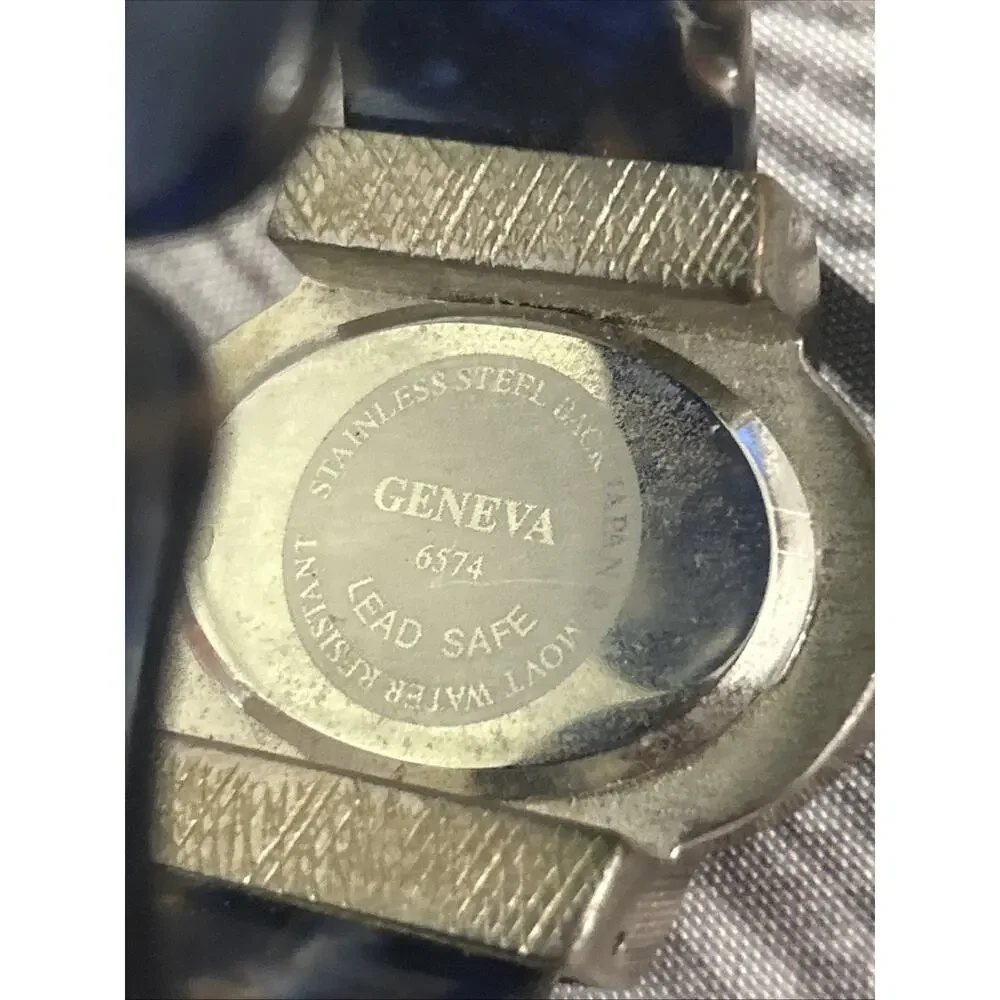 Geneva Silver Tone Multicolored Bezel And Band Women’s Cuff Watch